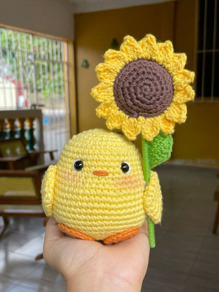 Pollito con girasol